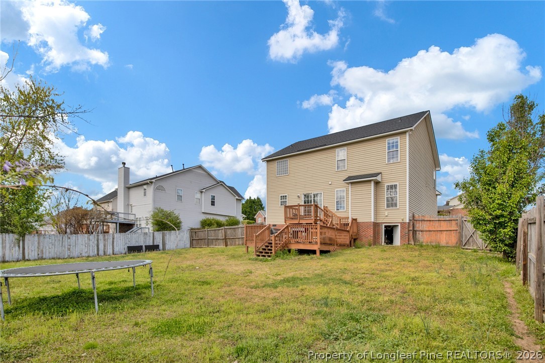 429 Bristlecone Road Fayetteville, NC 28311 - Photo 36 of 38 a view of a house with a big yard and potted plants