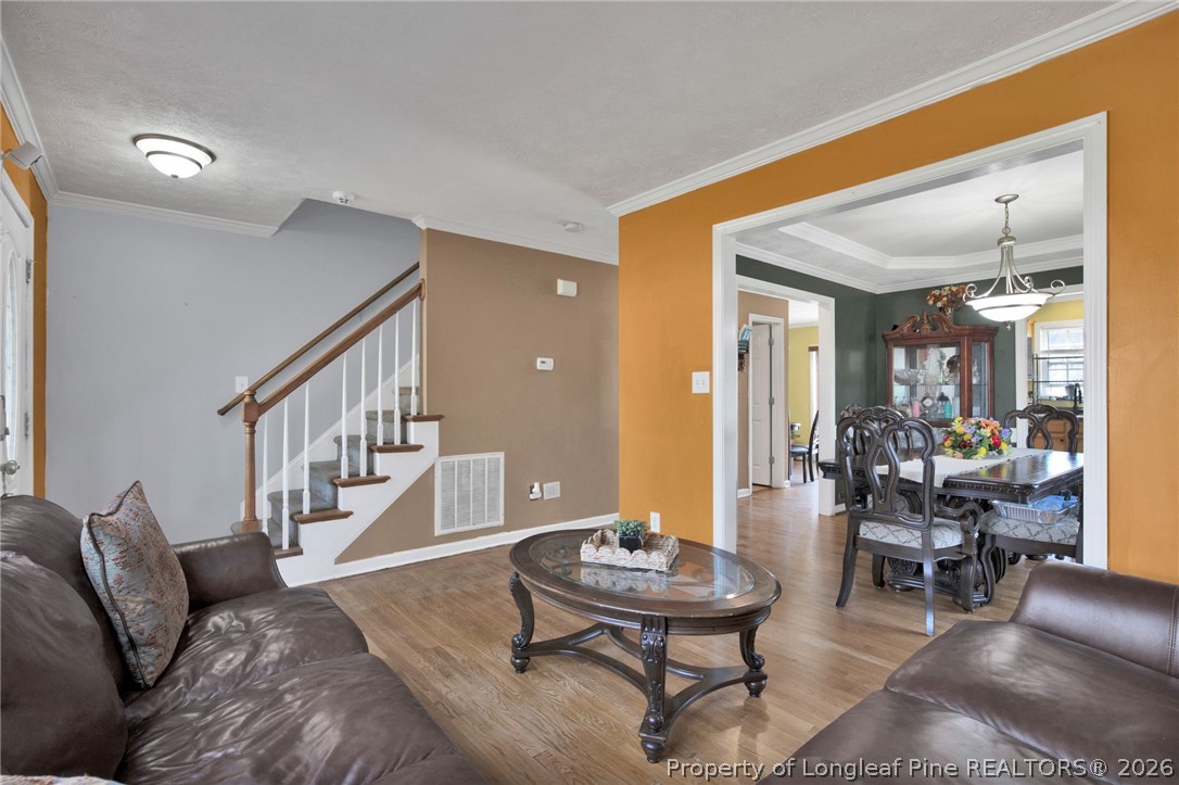 429 Bristlecone Road Fayetteville, NC 28311 - Photo 6 of 38 a living room with furniture and a table