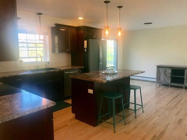 15 Richard Road Sidney, ME 04330 - Photo 5 of 25 Looking from the kitchen over to the...