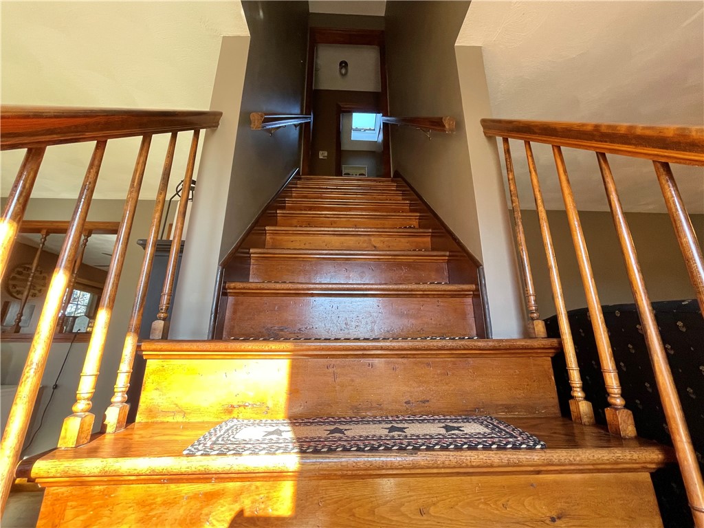 45 E Street Bristol, RI 02809 - Photo 18 of 39 Center staircase with hard woods.