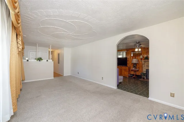 a view of a livingroom with a flat screen tv