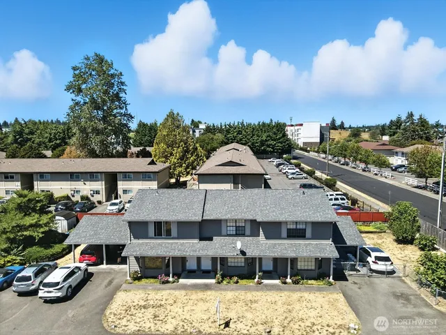 a aerial view of a house with swimming pool