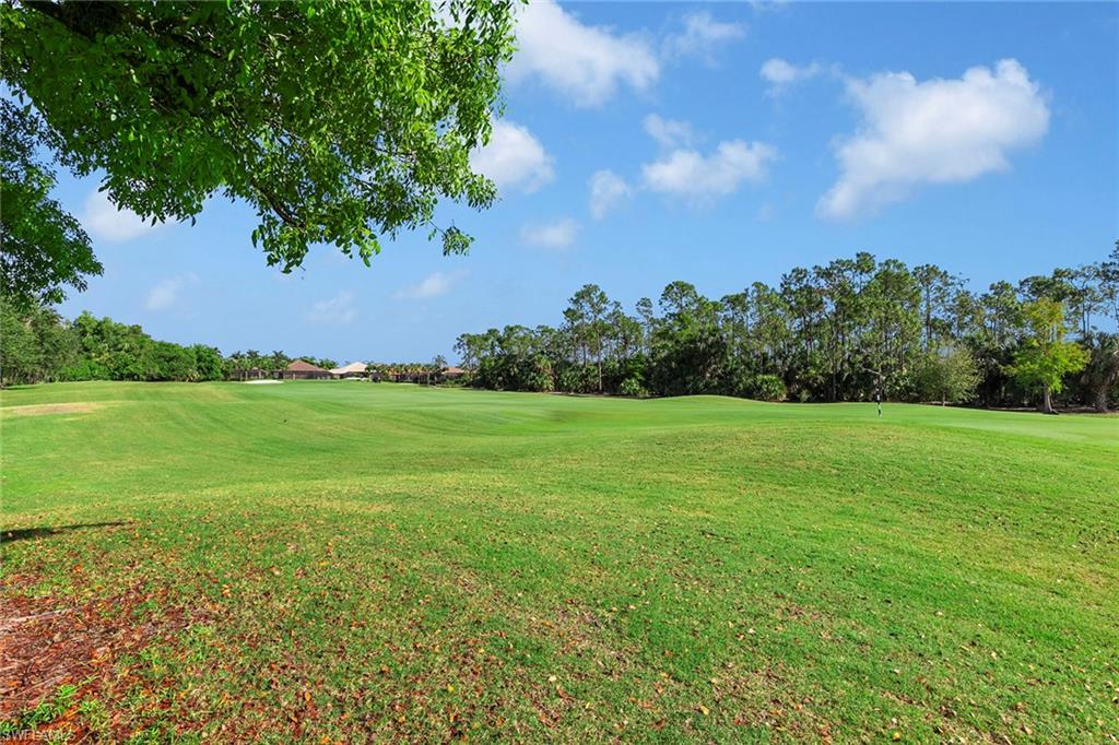 7778 Ashton Road Naples, FL 34113 - Photo 26 of 26 a view of a garden with an trees