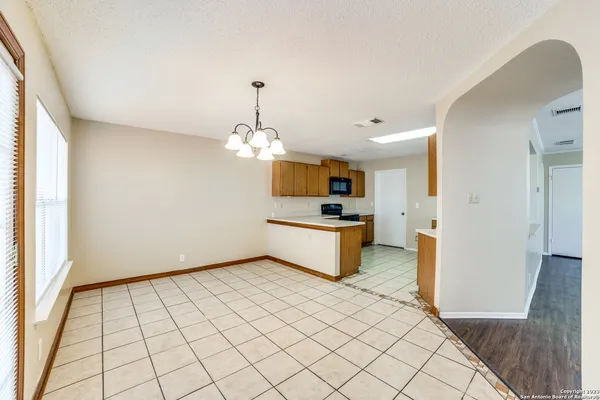 a view of a kitchen with a sink