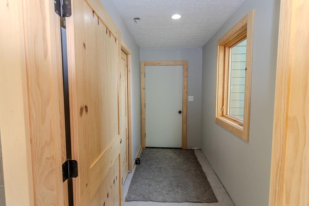 391 Sarvest Road Addison, PA 15411 - Photo 16 of 33 a view of a hallway with a glass door