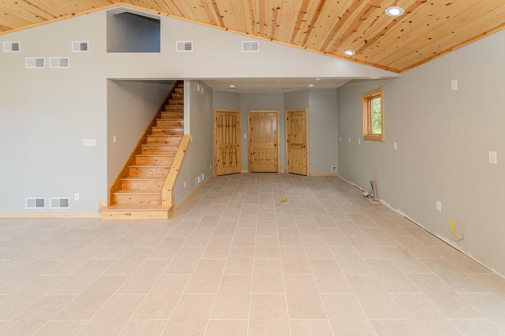 391 Sarvest Road Addison, PA 15411 - Photo 17 of 33 a view of a hallway with staircase
