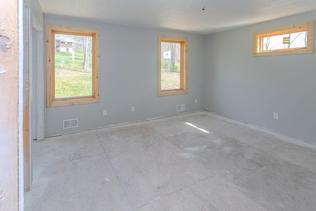 391 Sarvest Road Addison, PA 15411 - Photo 28 of 33 a view of an empty room with a window