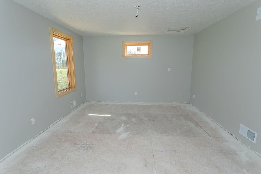 391 Sarvest Road Addison, PA 15411 - Photo 29 of 33 an empty room that has a window
