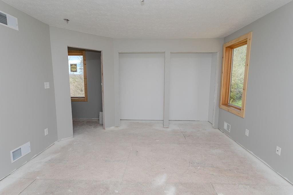 391 Sarvest Road Addison, PA 15411 - Photo 30 of 33 a view of an empty room with window and closet area