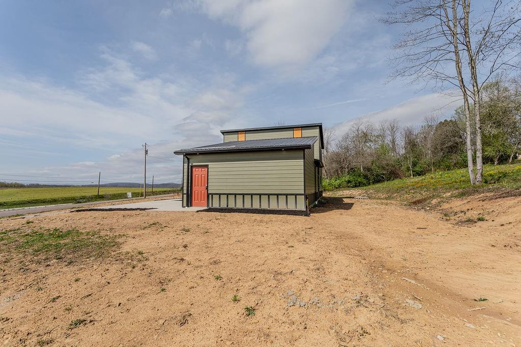 391 Sarvest Road Addison, PA 15411 - Photo 7 of 33 a view of a dry yard with a barn