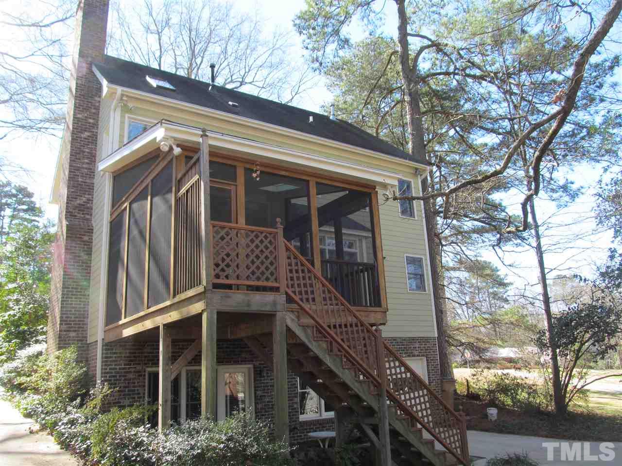 2506 Mayview Road Raleigh, NC 27607 - Photo 2 of 29 a front view of a house with a tree