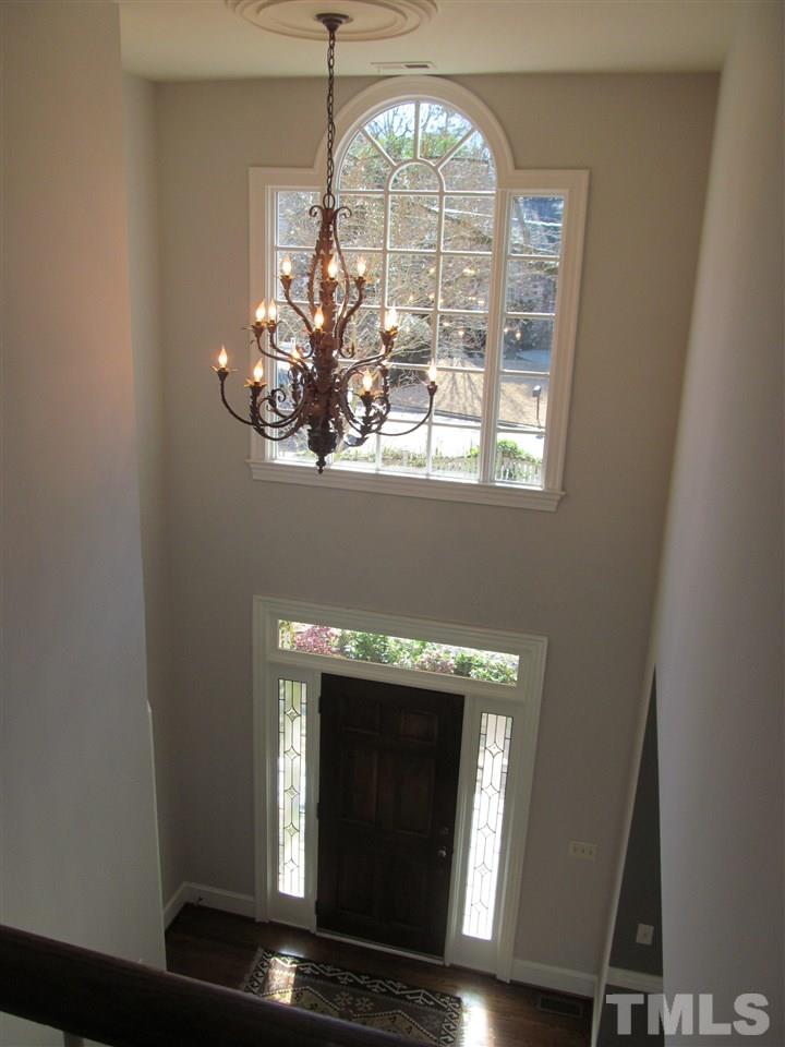 2506 Mayview Road Raleigh, NC 27607 - Photo 3 of 29 a view of fireplace with wooden floor