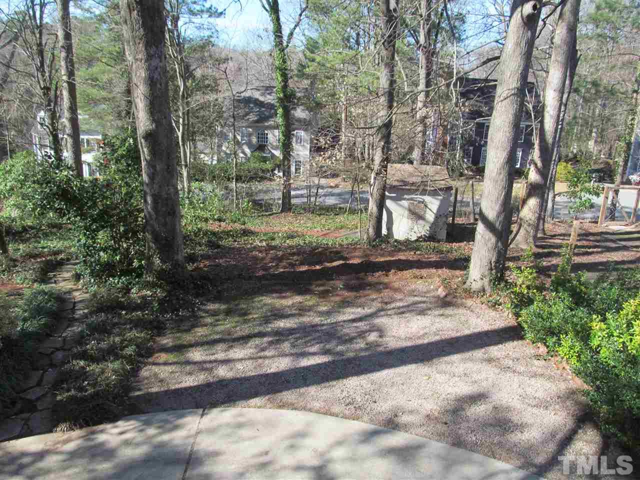 2506 Mayview Road Raleigh, NC 27607 - Photo 26 of 29 a view of a yard with plants and trees
