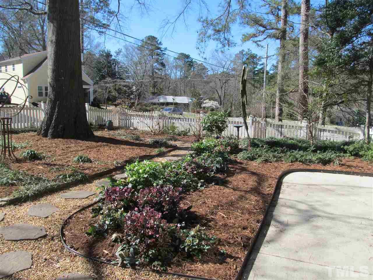 2506 Mayview Road Raleigh, NC 27607 - Photo 29 of 29 a view of a backyard with large trees