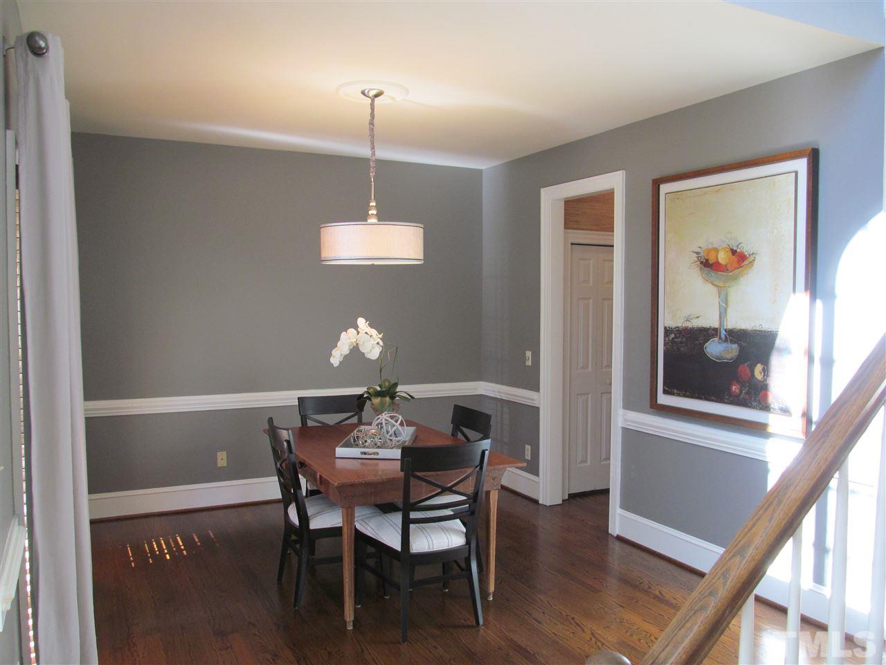 2506 Mayview Road Raleigh, NC 27607 - Photo 7 of 29 a view of a dining room with furniture window and wooden floor