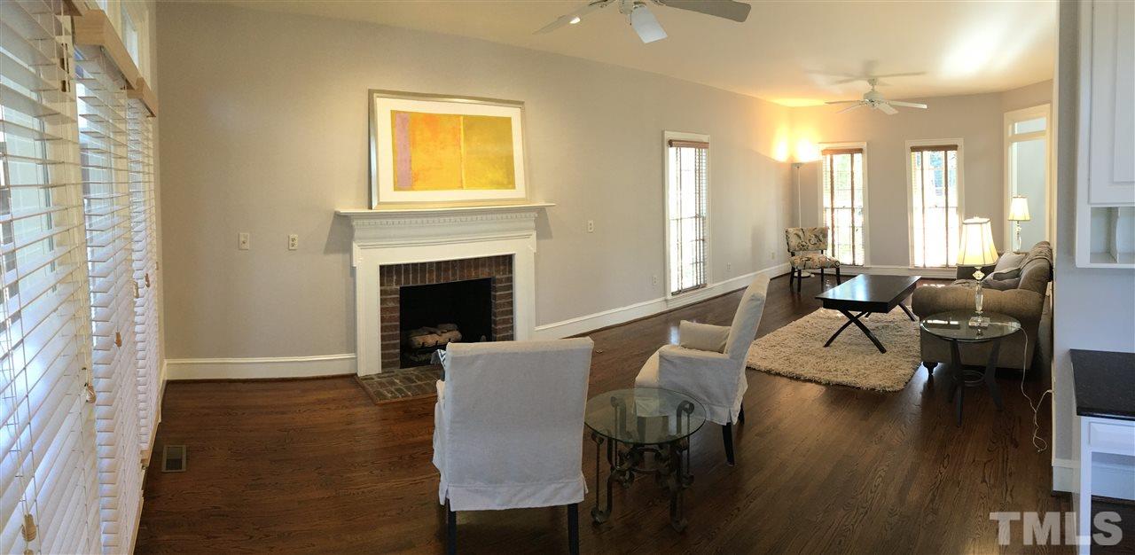 2506 Mayview Road Raleigh, NC 27607 - Photo 8 of 29 a living room with furniture and a fireplace