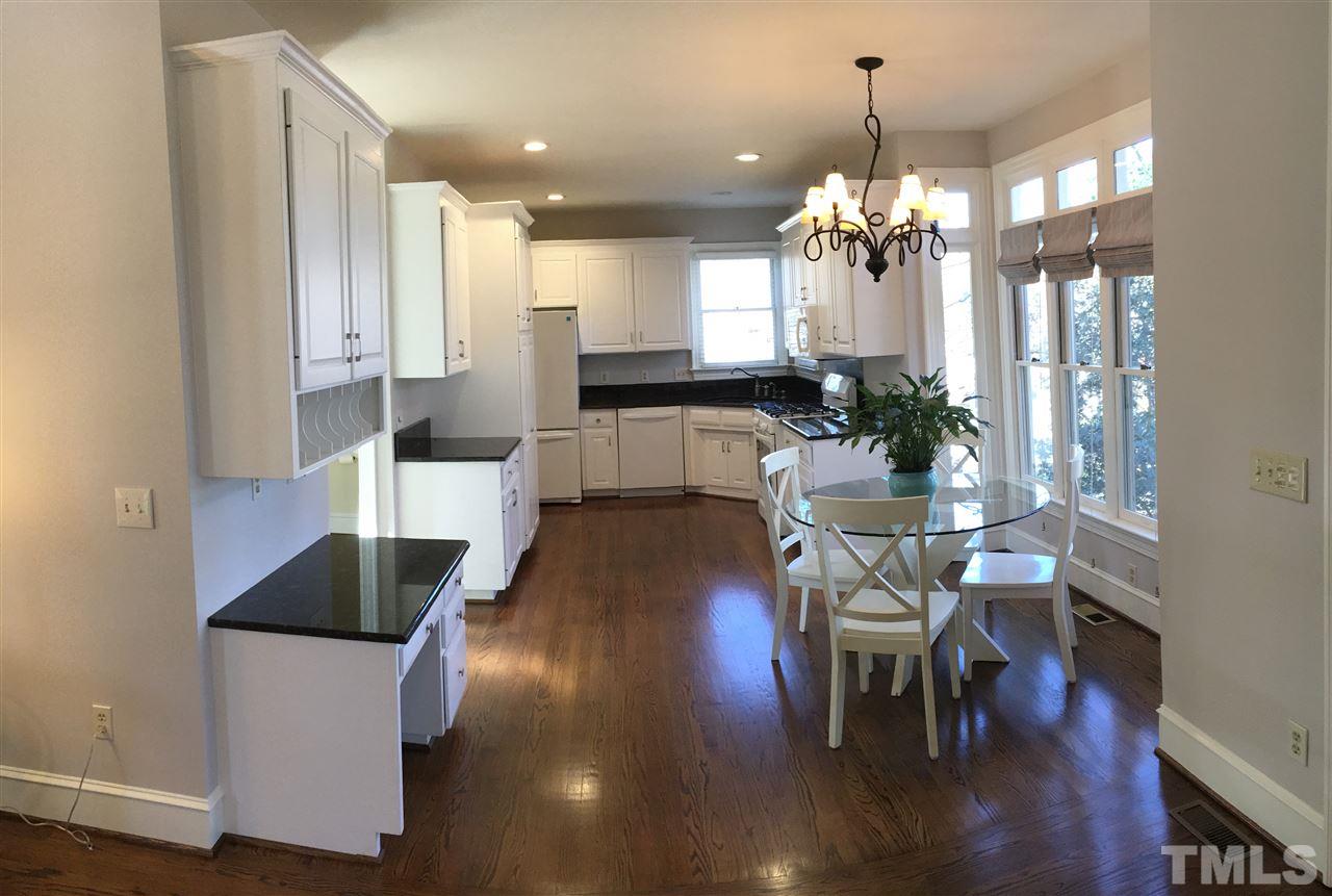 2506 Mayview Road Raleigh, NC 27607 - Photo 9 of 29 a view of a dining room with furniture and wooden floor
