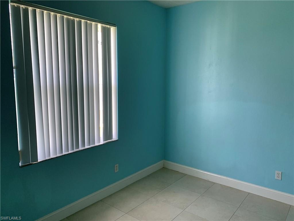 697 Crossfield Circle Naples, FL 34104 - Photo 12 of 12 a view of a room with a window