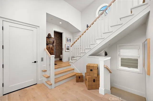 a en suite spacious bathroom with a tub sink and mirror