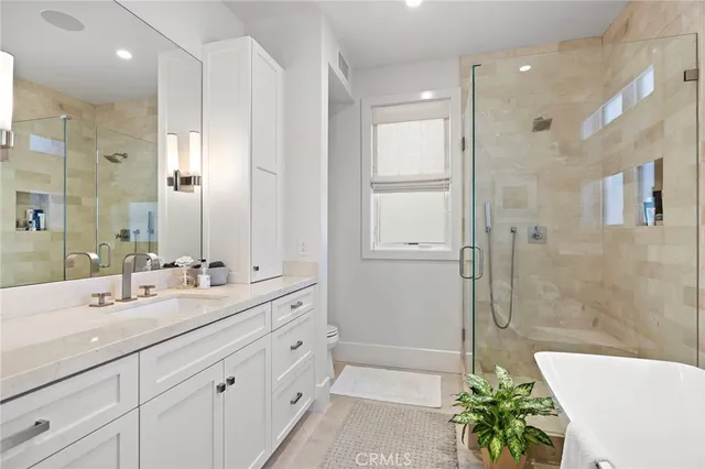 a terrace with outdoor seating and city view