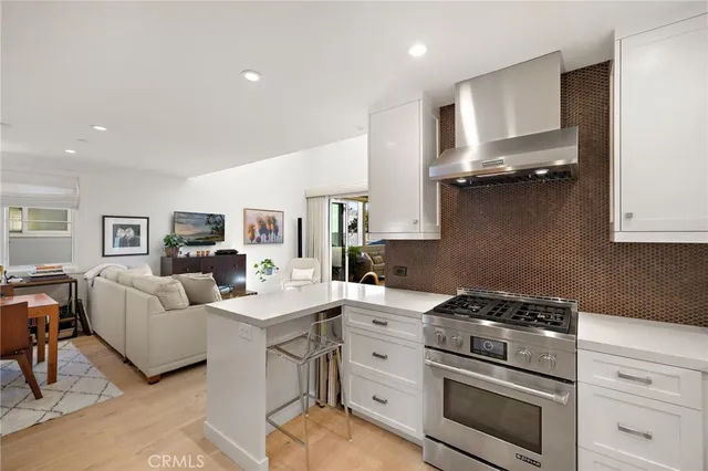 a bathroom with a double vanity sink mirror and shower