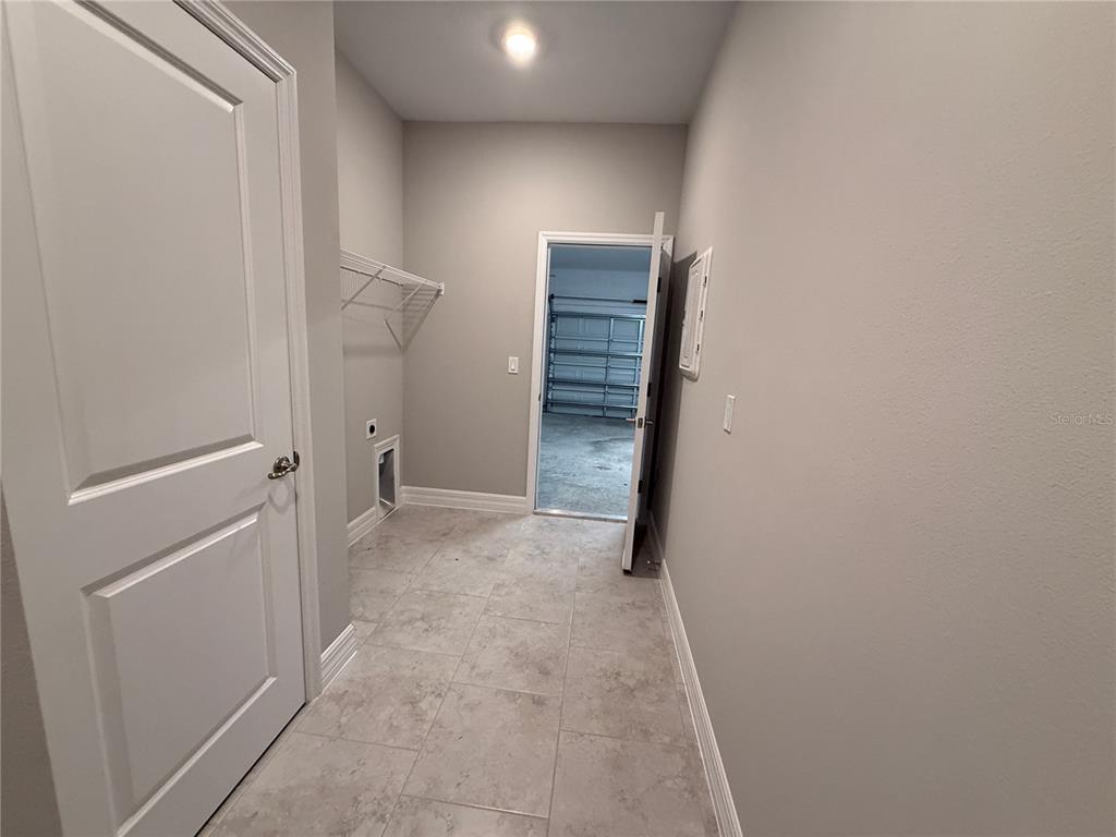 1569 Kerman Street North Port, FL 34288 - Photo 20 of 26 a view of room and stairs