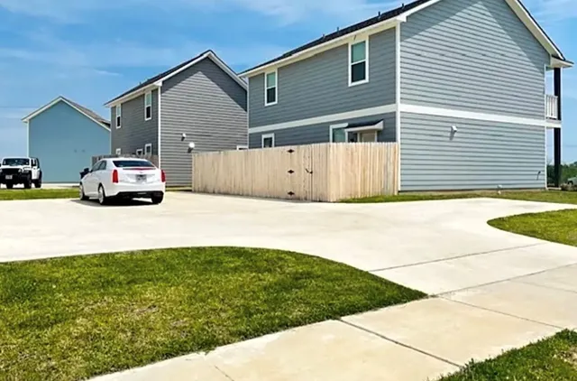 a car parked in front of a house