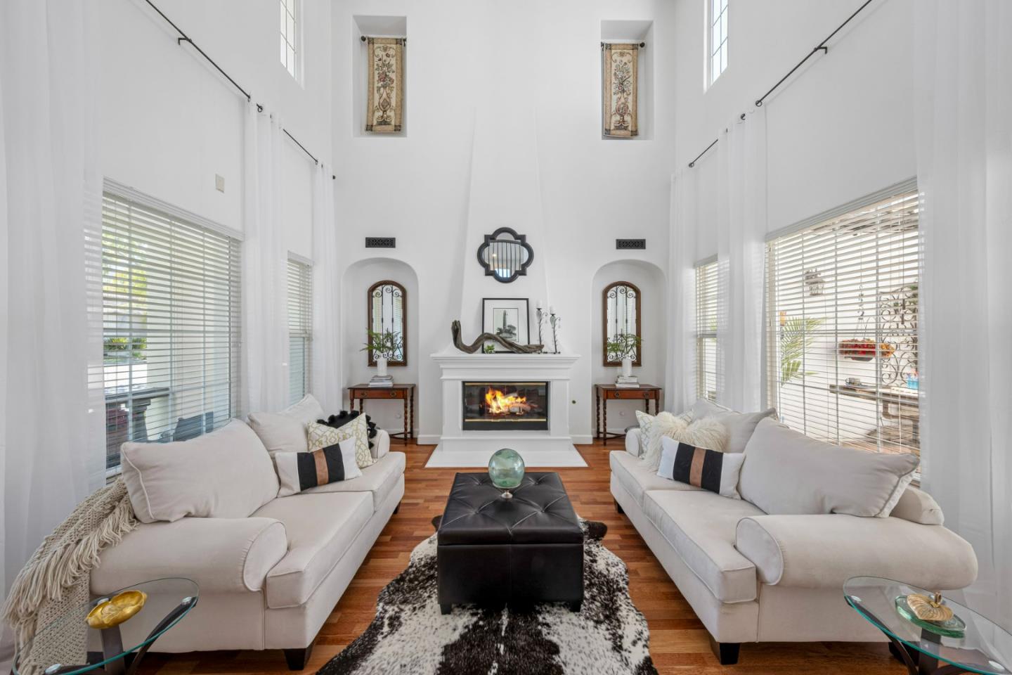 1913 St Andrews Circle Gilroy, CA 95020 - Photo 12 of 79 a living room with furniture a fireplace and a large window