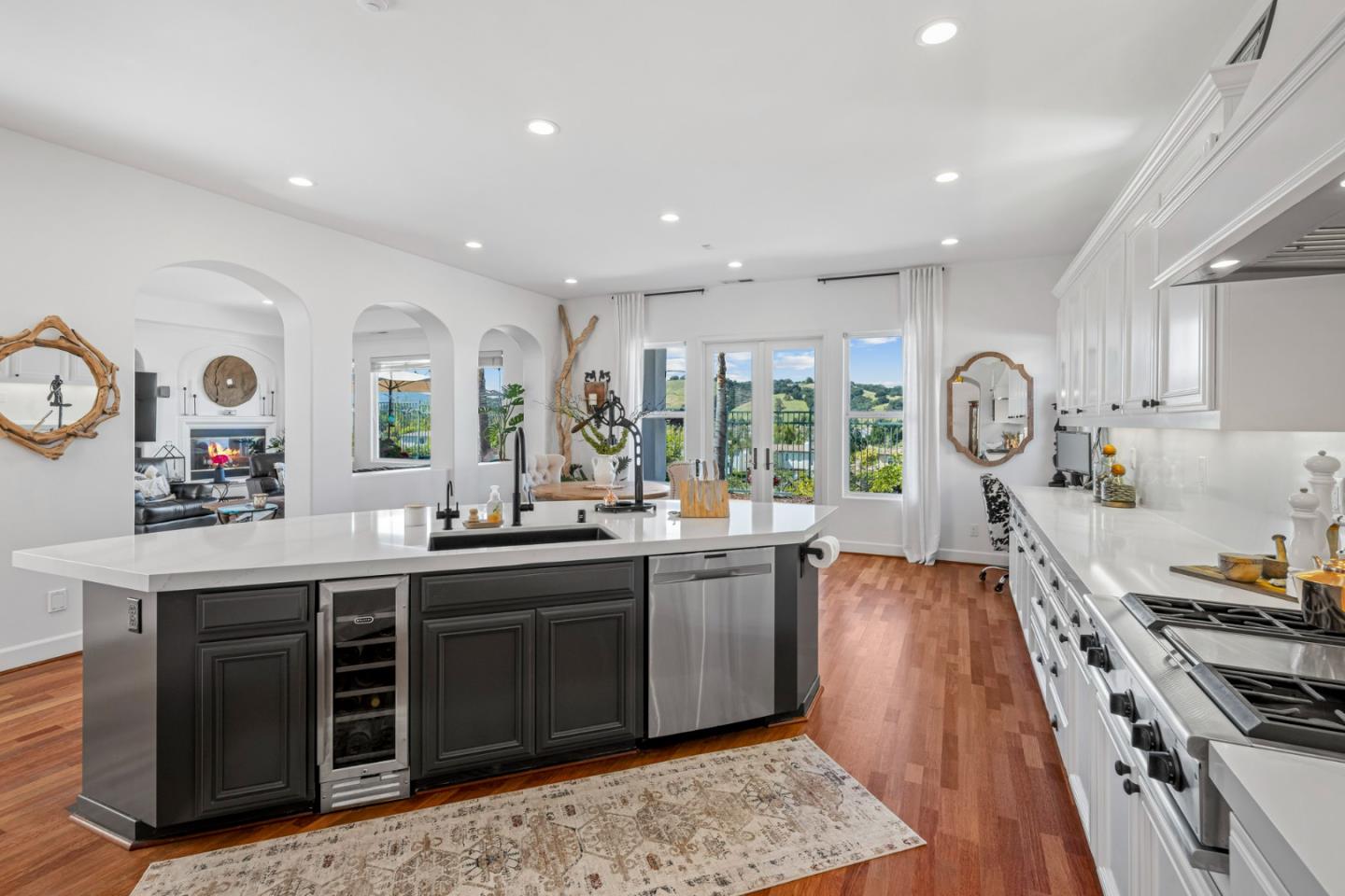 1913 St Andrews Circle Gilroy, CA 95020 - Photo 21 of 79 a kitchen with stainless steel appliances granite countertop a stove and a sink