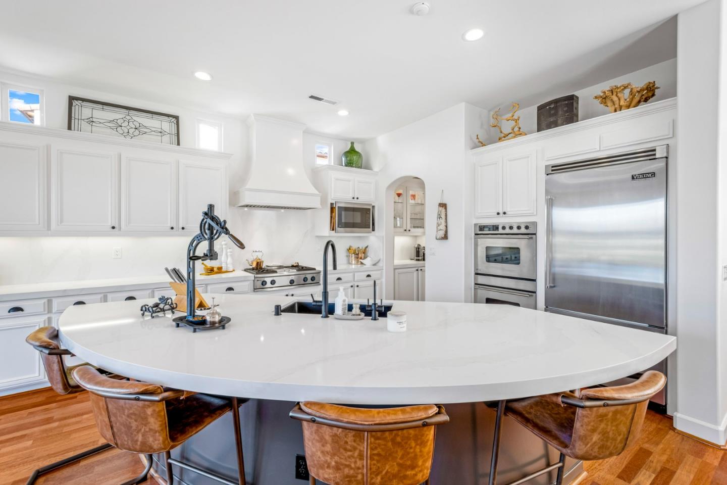 1913 St Andrews Circle Gilroy, CA 95020 - Photo 24 of 79 a kitchen with stainless steel appliances a kitchen island a stove a table and chairs
