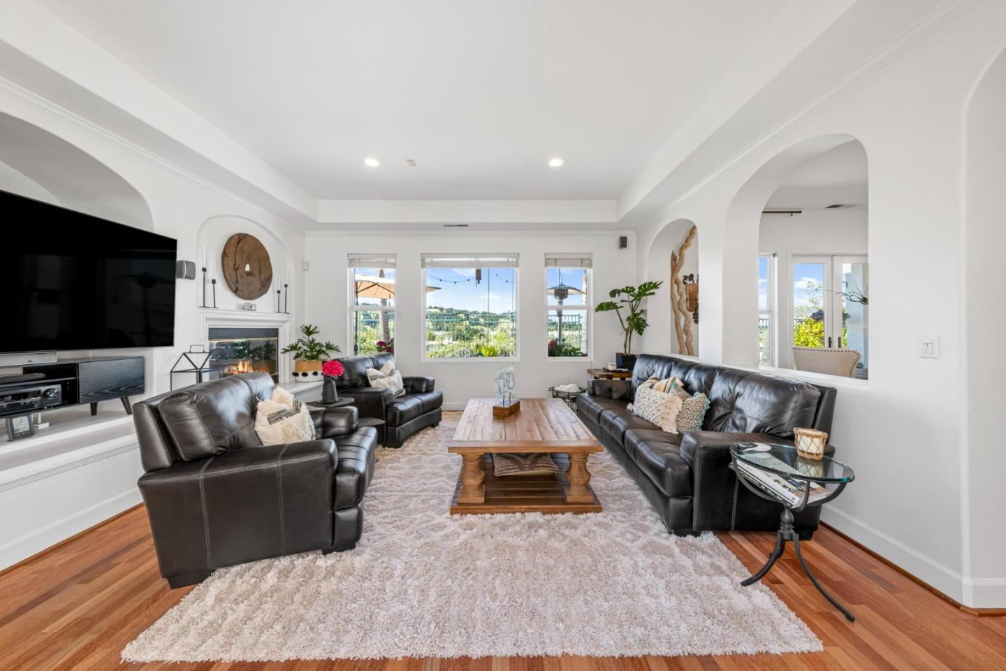 1913 St Andrews Circle Gilroy, CA 95020 - Photo 28 of 79 a living room with fireplace furniture and a flat screen tv
