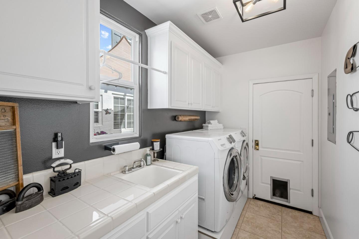 1913 St Andrews Circle Gilroy, CA 95020 - Photo 32 of 79 a utility room with dryer and washer