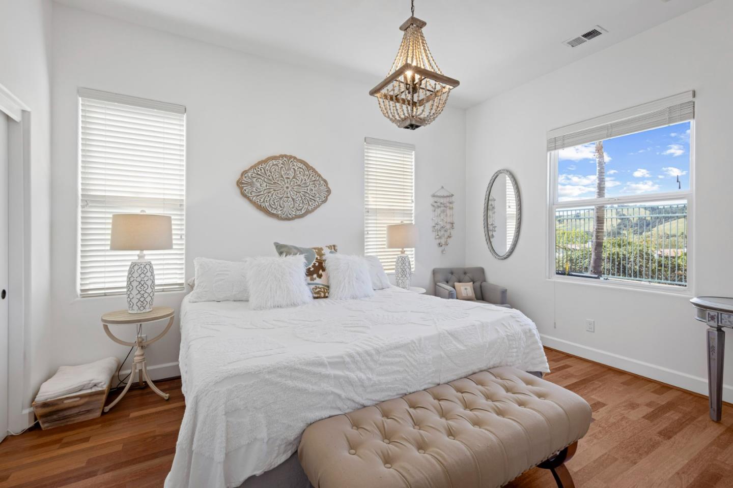 1913 St Andrews Circle Gilroy, CA 95020 - Photo 34 of 79 a bedroom with a bed and a chandelier