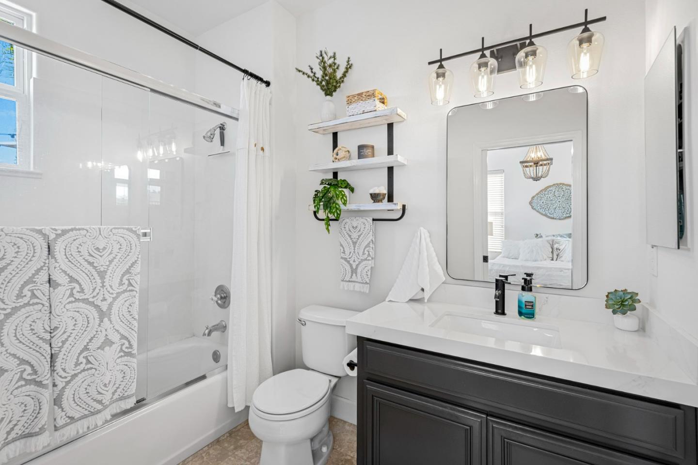 1913 St Andrews Circle Gilroy, CA 95020 - Photo 36 of 79 a bathroom with a sink a toilet and shower