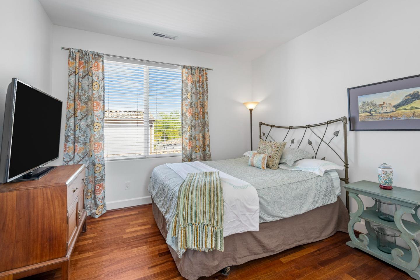 1913 St Andrews Circle Gilroy, CA 95020 - Photo 43 of 79 a bedroom with bed and flat tv screen on dresser