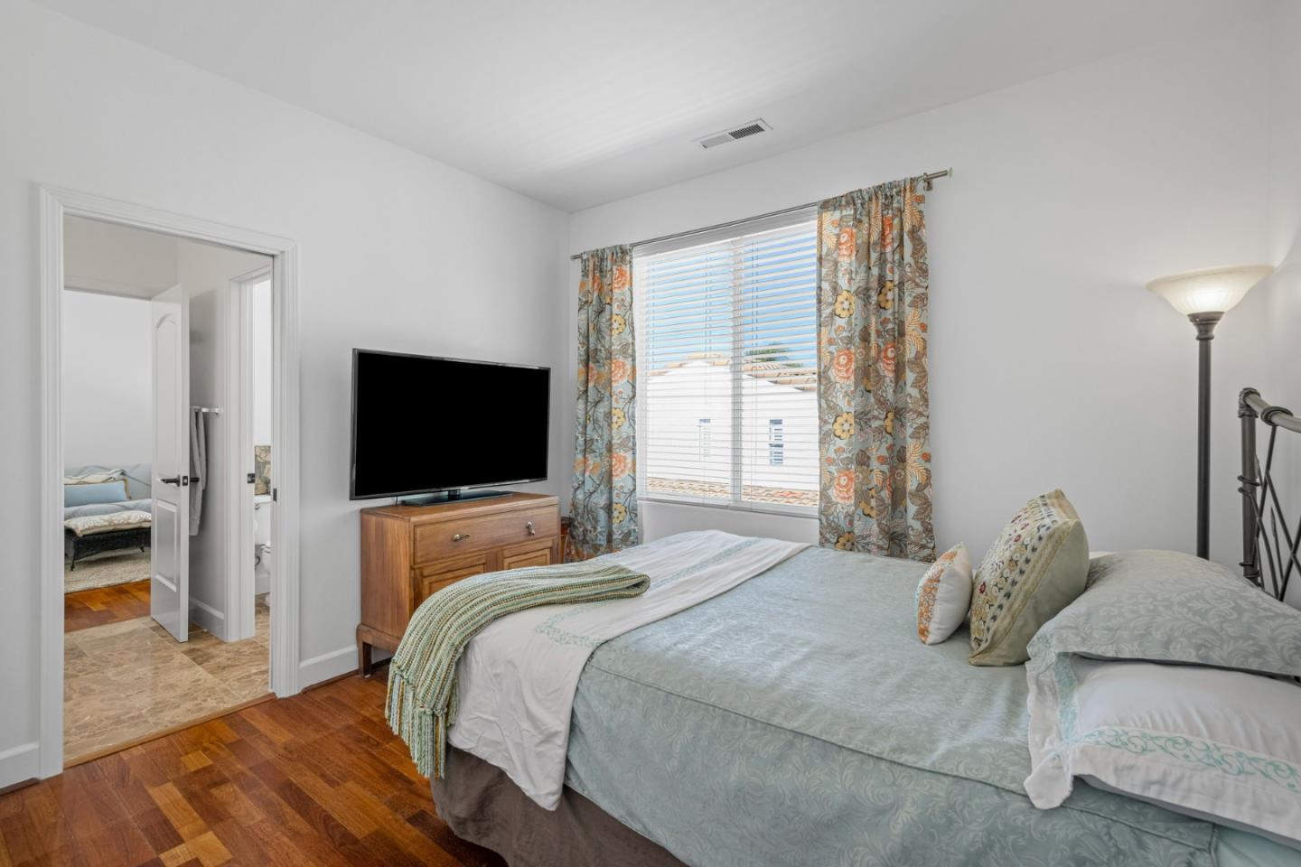 1913 St Andrews Circle Gilroy, CA 95020 - Photo 44 of 79 a bedroom with a bed and a flat screen tv