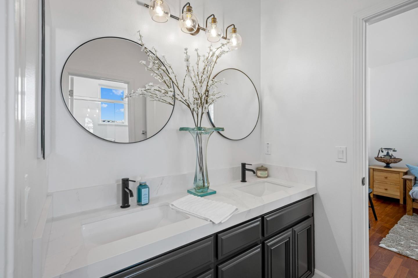 1913 St Andrews Circle Gilroy, CA 95020 - Photo 45 of 79 a bathroom with a sink and a mirror