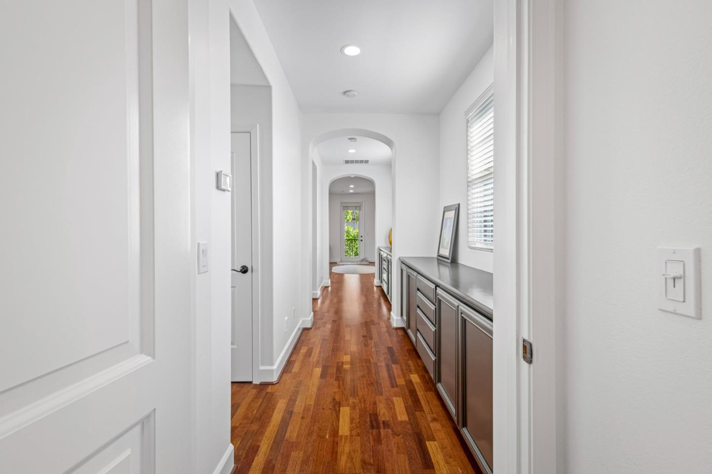 1913 St Andrews Circle Gilroy, CA 95020 - Photo 49 of 79 a view of a hallway with wooden floor and staircase