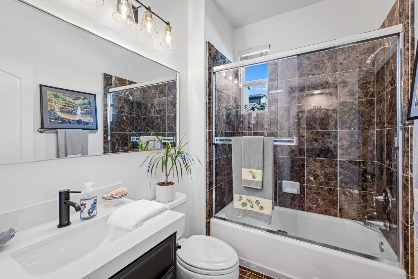 1913 St Andrews Circle Gilroy, CA 95020 - Photo 9 of 79 a bathroom with a sink toilet and shower