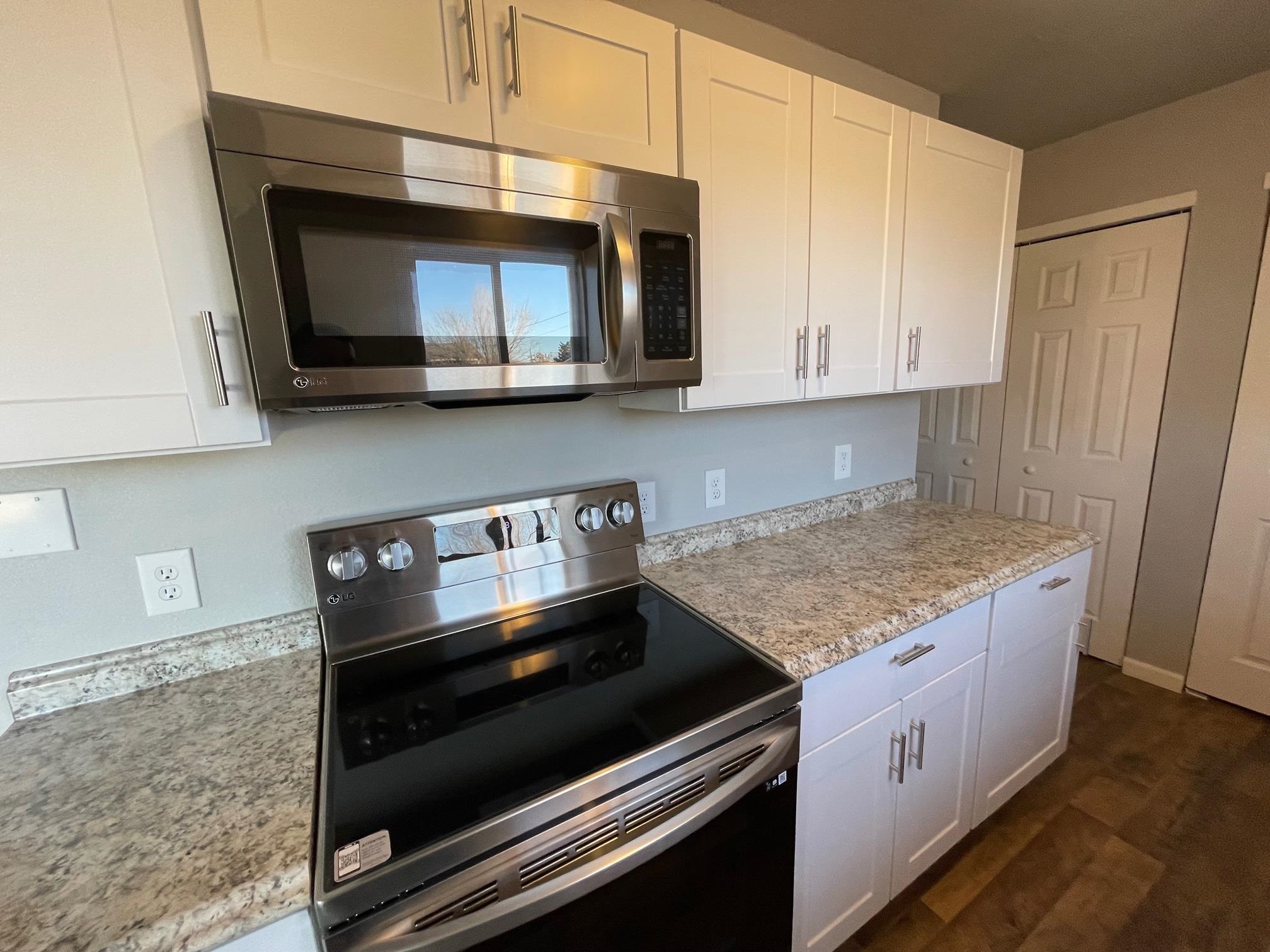 3206 D D 1/4 Road Clifton, CO 81520 - Photo 12 of 39 a kitchen with a stove and a microwave