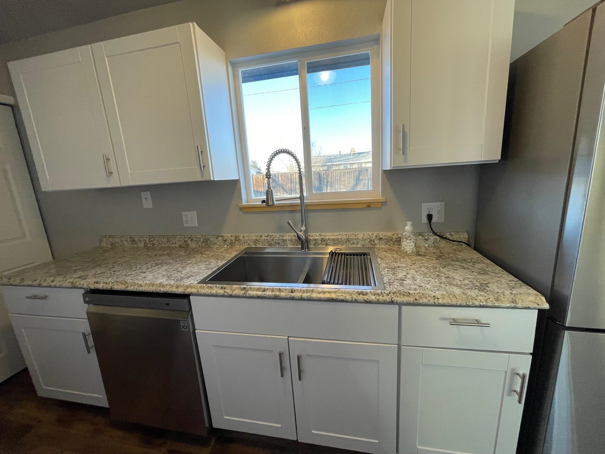 3206 D D 1/4 Road Clifton, CO 81520 - Photo 15 of 39 a kitchen with a sink and cabinets