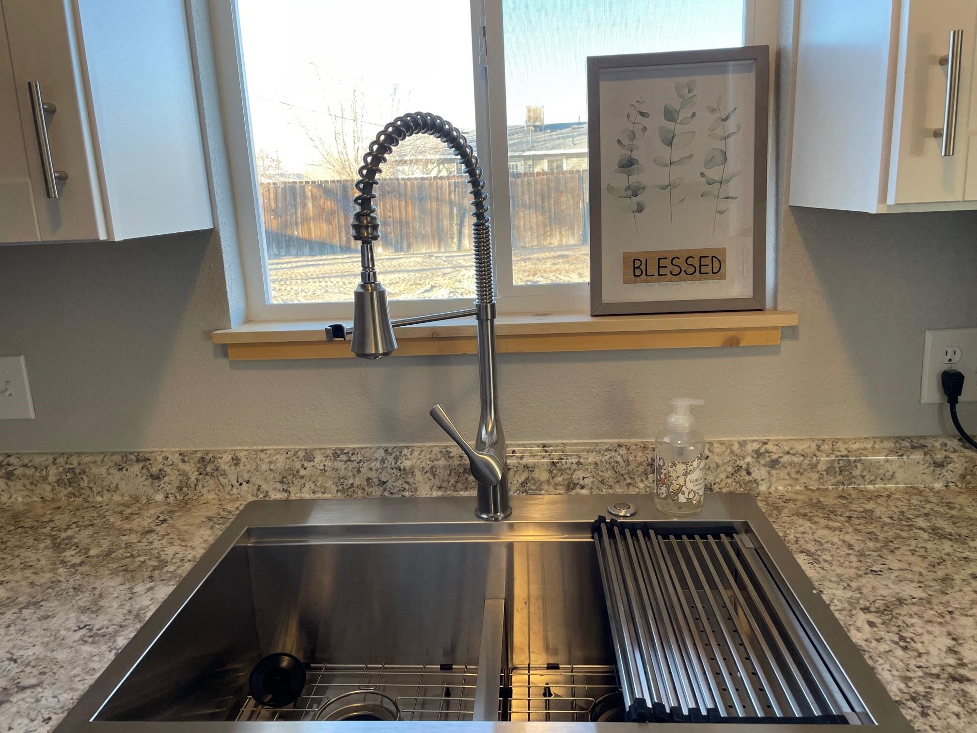 3206 D D 1/4 Road Clifton, CO 81520 - Photo 16 of 39 a kitchen with a sink and cabinets