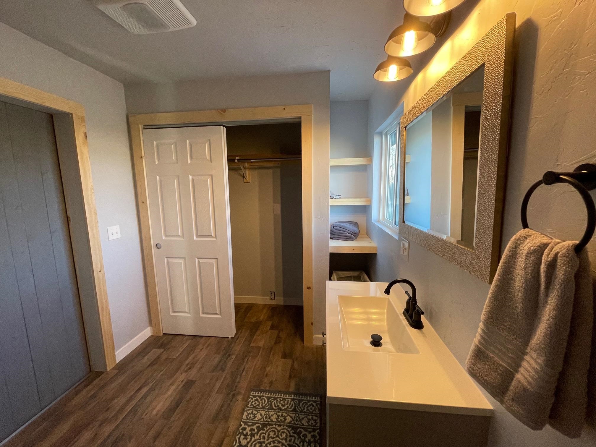 3206 D D 1/4 Road Clifton, CO 81520 - Photo 27 of 39 a bathroom with a sink and mirror