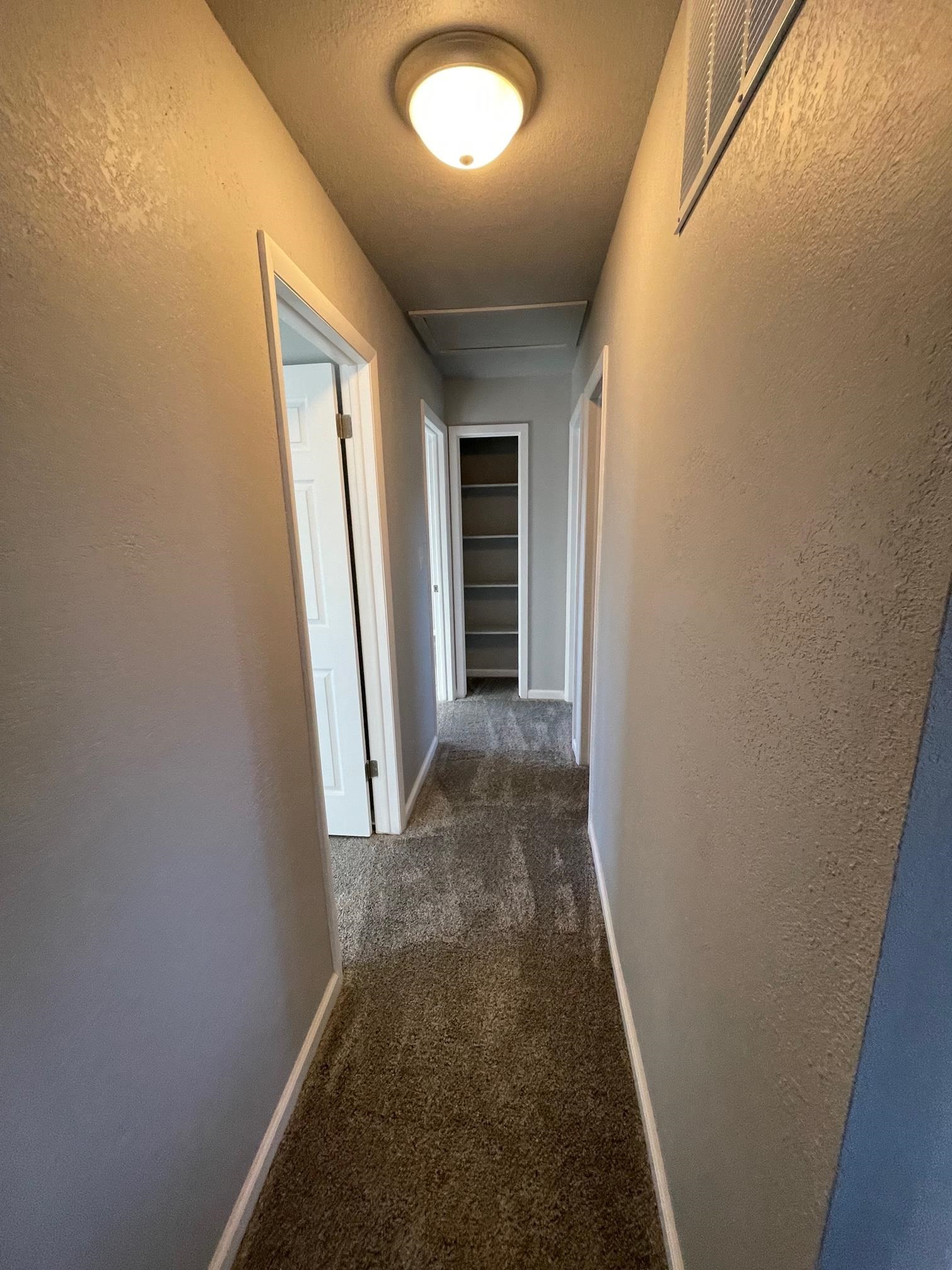 3206 D D 1/4 Road Clifton, CO 81520 - Photo 28 of 39 view of a hallway with wooden floor and a window
