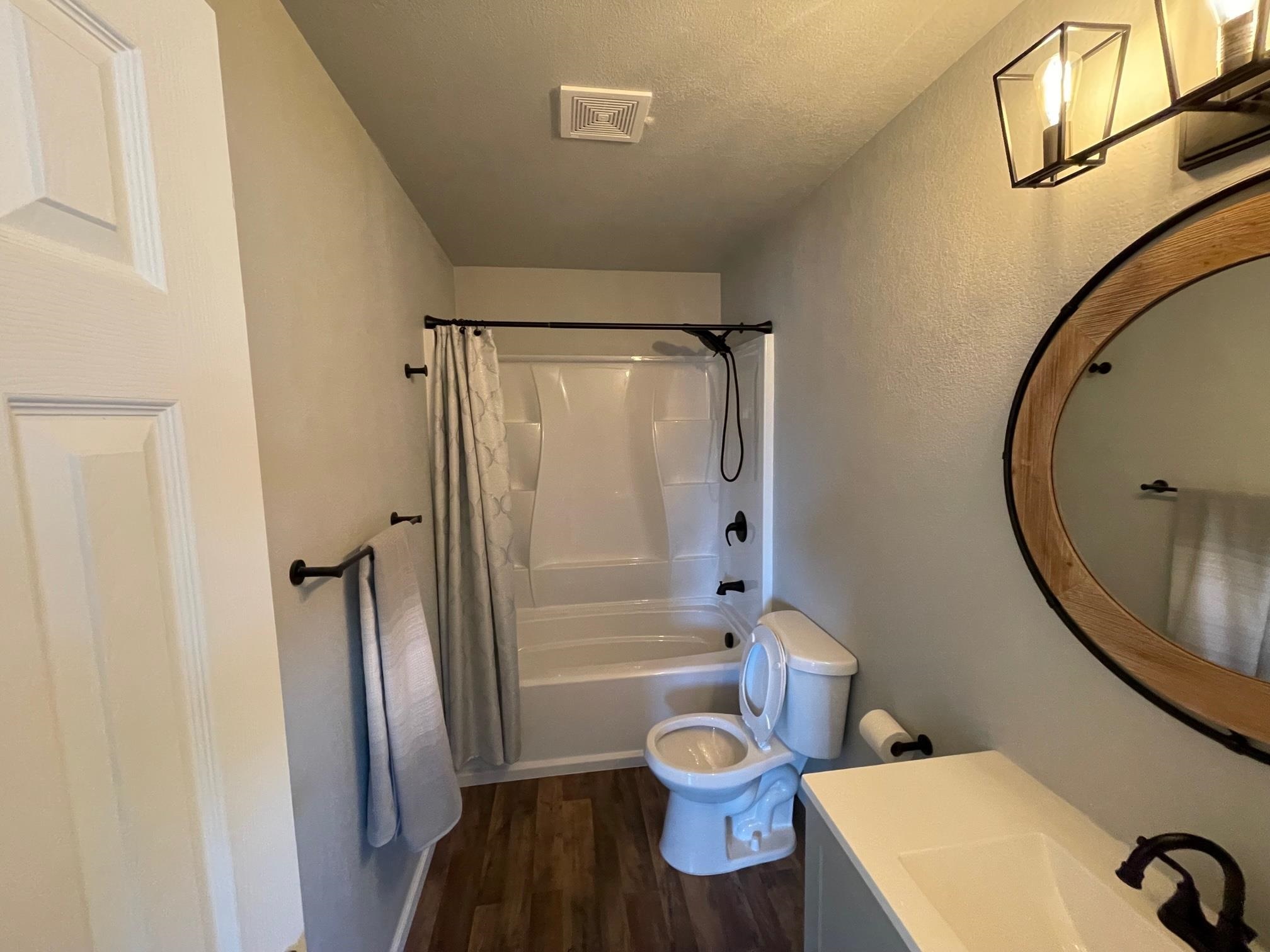 3206 D D 1/4 Road Clifton, CO 81520 - Photo 31 of 39 a bathroom with a toilet and a mirror