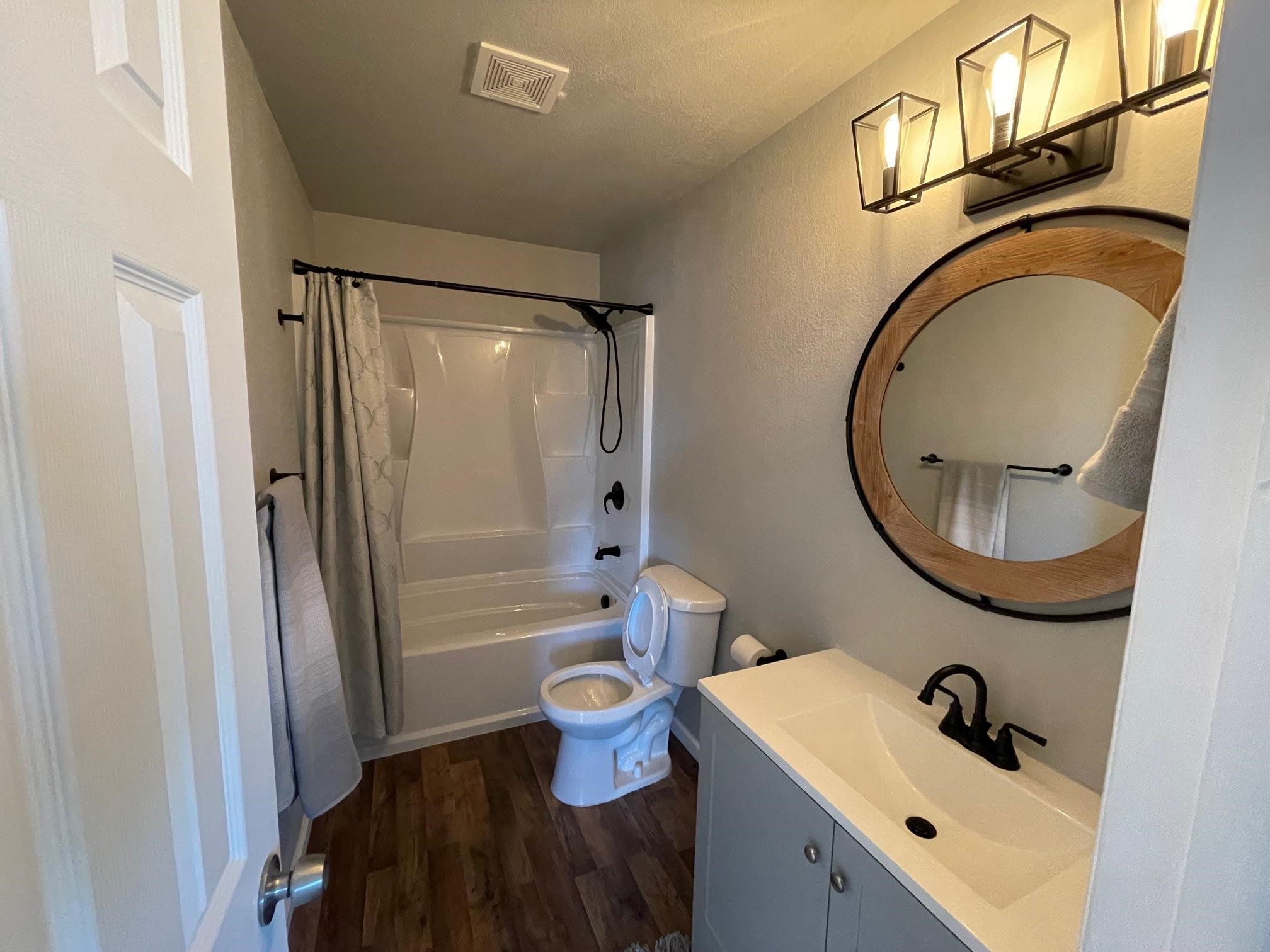 3206 D D 1/4 Road Clifton, CO 81520 - Photo 32 of 39 a bathroom with a sink a toilet and a mirror