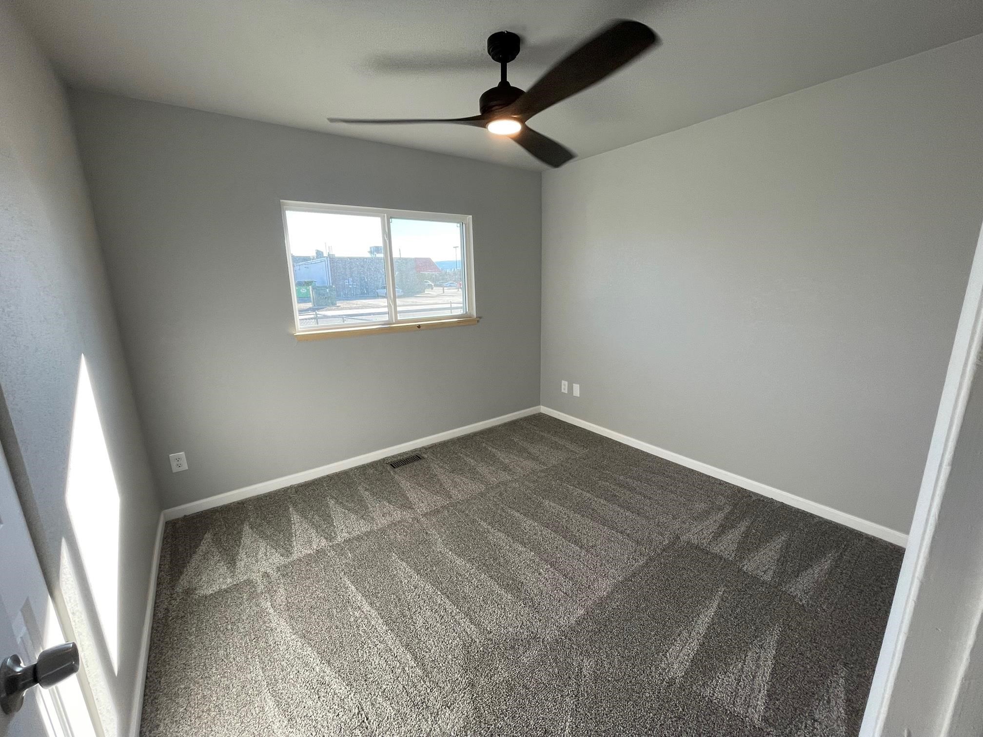 3206 D D 1/4 Road Clifton, CO 81520 - Photo 36 of 39 an empty room with a window