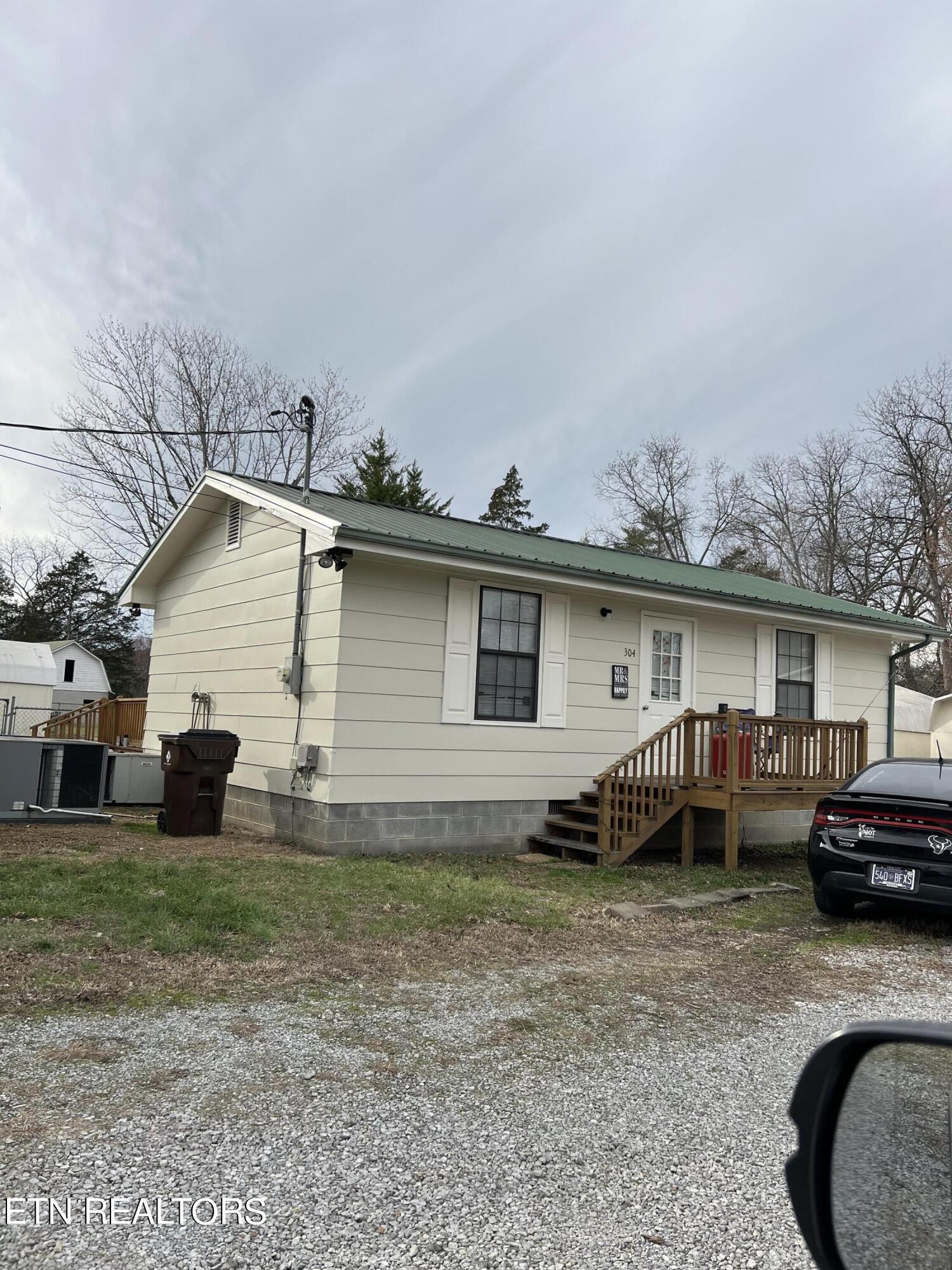 306 Englewood Road Madisonville, TN 37354 - Photo 13 of 34 a view of a house with a patio