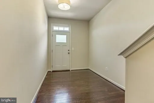 a view of a livingroom with wooden floor