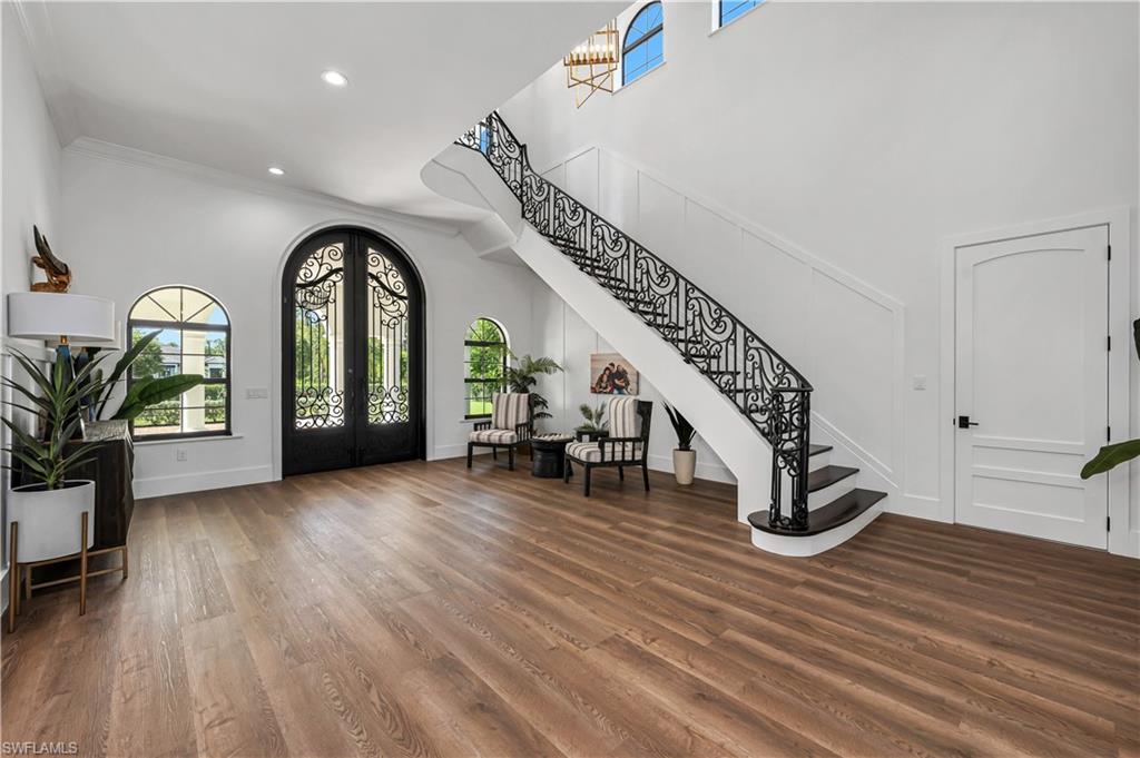 6689 Hunters Road Naples, FL 34109 - Photo 21 of 35 a view of entryway with livingroom and furniture